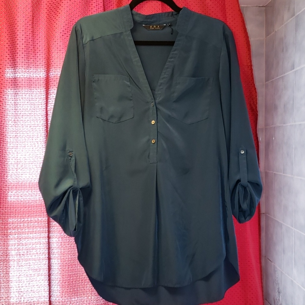 Teal pullover tunic top.  Smoke/pet free home.
